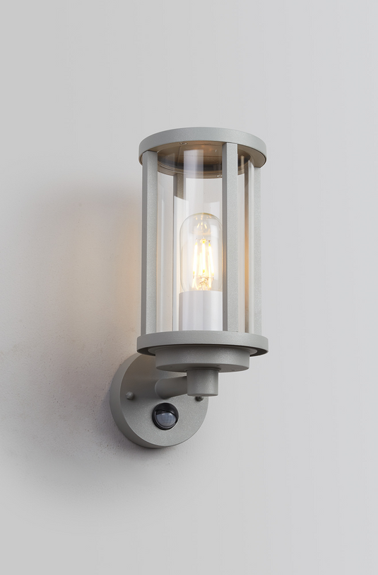 C-Lighting Zande Cylinder Wall Lamp With PIR Sensor, 1 x E27, IP44, Matt Silver/Clear - 59746